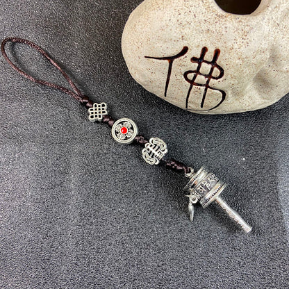 Ethnic-style Tibetan souvenirs: cross-style vajra pendants, small prayer pendants, pendants for carts, and accessories