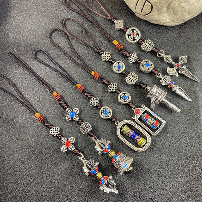 Ethnic-style Tibetan souvenirs: cross-style vajra pendants, small prayer pendants, pendants for carts, and accessories