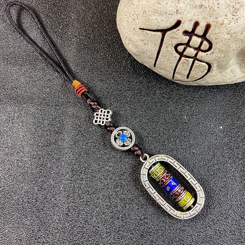 Ethnic-style Tibetan souvenirs: cross-style vajra pendants, small prayer pendants, pendants for carts, and accessories
