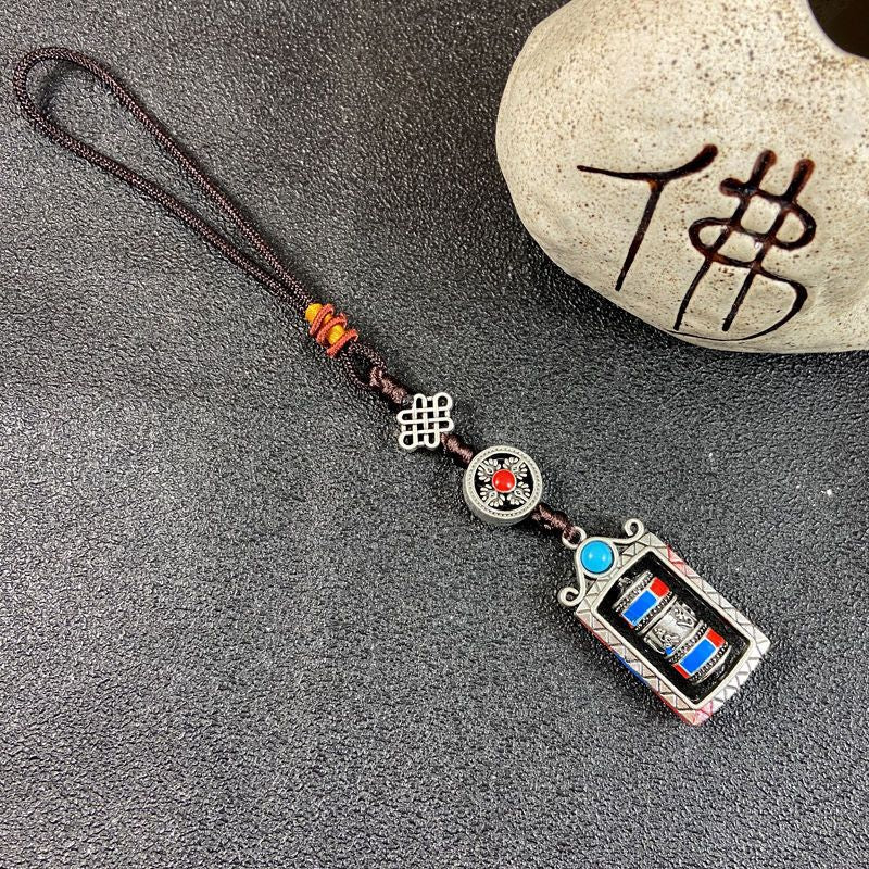 Ethnic-style Tibetan souvenirs: cross-style vajra pendants, small prayer pendants, pendants for carts, and accessories