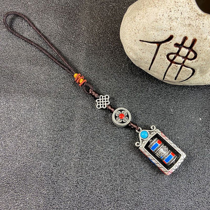 Ethnic-style Tibetan souvenirs: cross-style vajra pendants, small prayer pendants, pendants for carts, and accessories