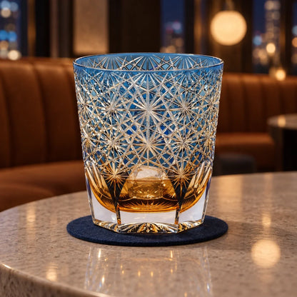 Daisy Edo Kiriko Whisky Glass, Blue, with whisky and one ice cube — AI-generated nighttime styling