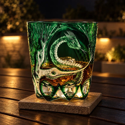 Serpent Edo Kiriko Whisky Glass, Green, with whisky and one ice cube — AI-generated nighttime styling